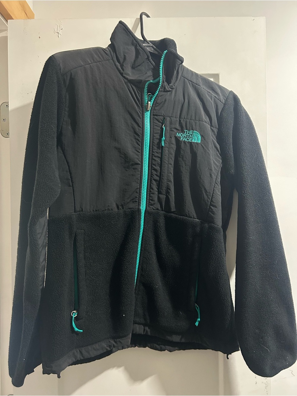 The North Face Black and teal Sherpa zip up